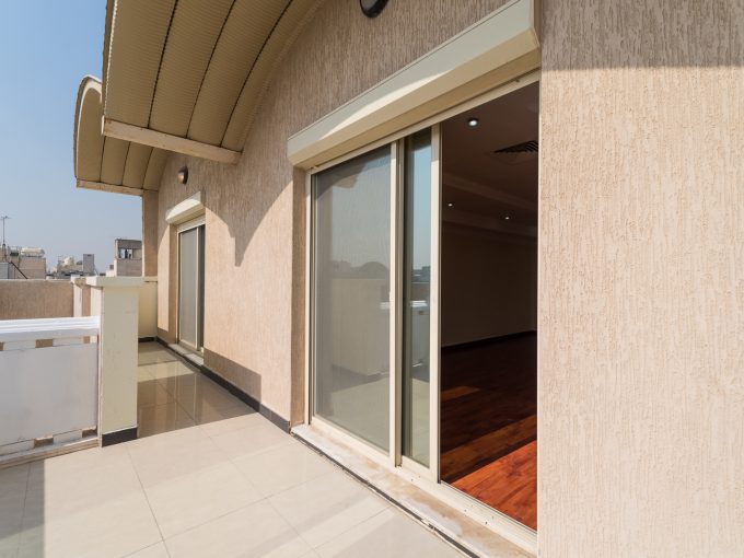 Salwa – older, unfurnished three bedroom apartment w/large balcony